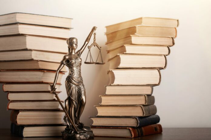 Statue of justice on Bokeh background